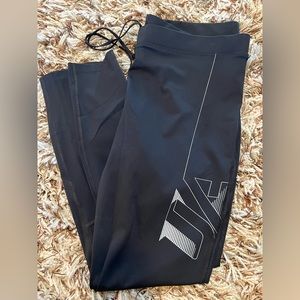 NWT mens Under Armour tights. with drawstring waist and zippers on legs XXL.